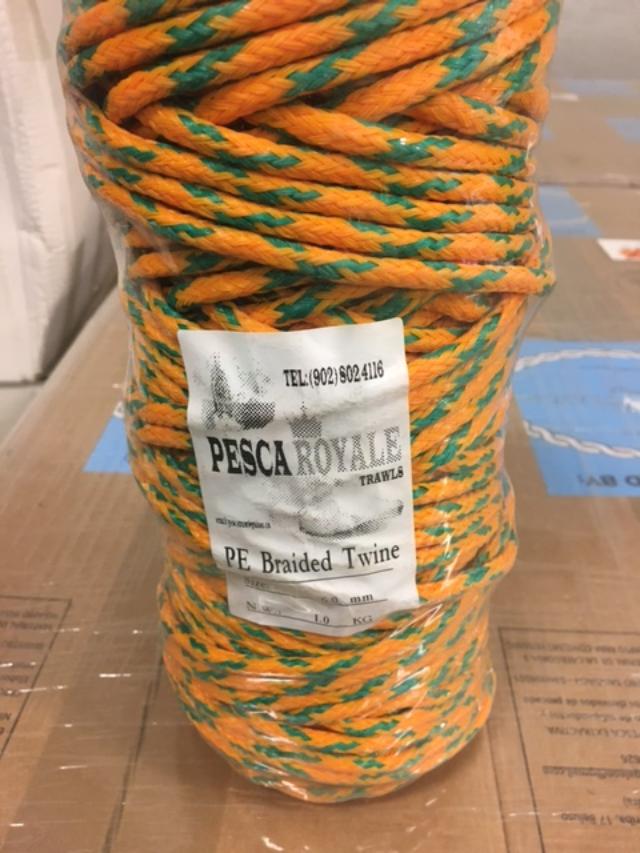 Coiled natural fiber fishing rope used in Nova Scotia